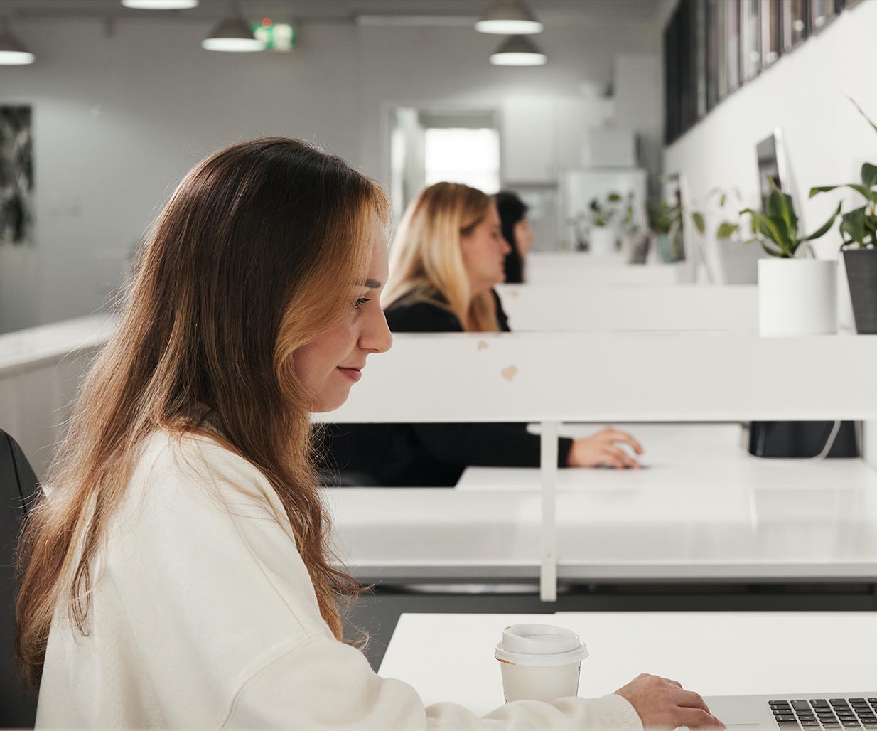 This photo shows Communication Designers working on a Digital Branding design brief inside the Percept Digital Design Agency in Sydney, Australia.